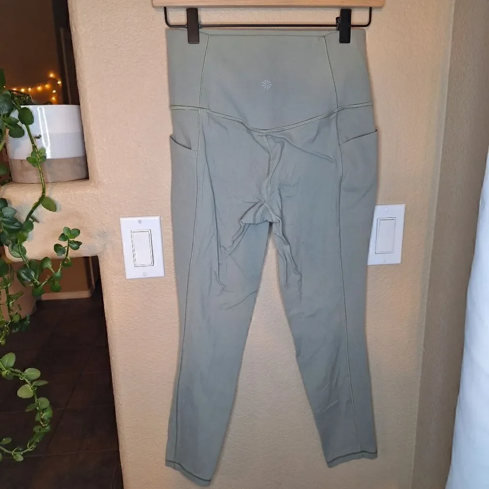 Athleta salutation 7/8 tight small green